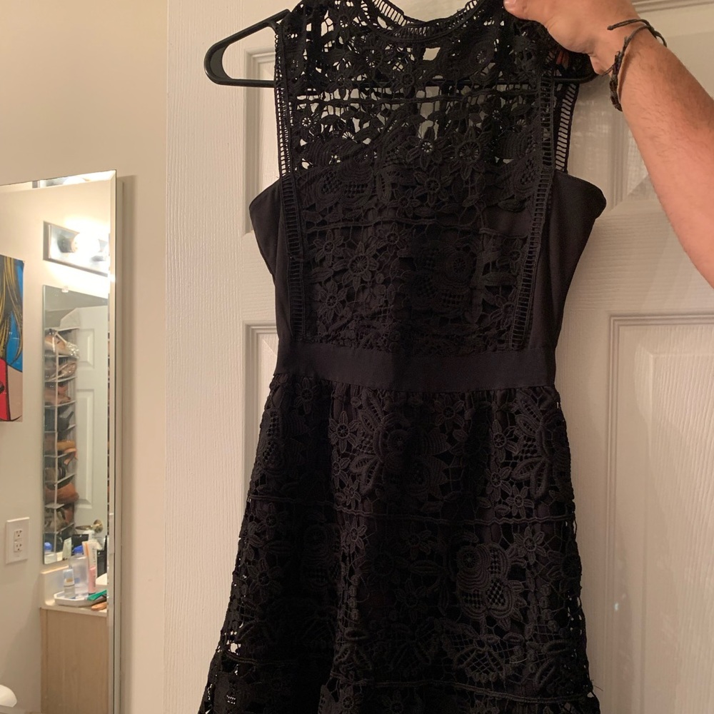 Small short black lace skater dress